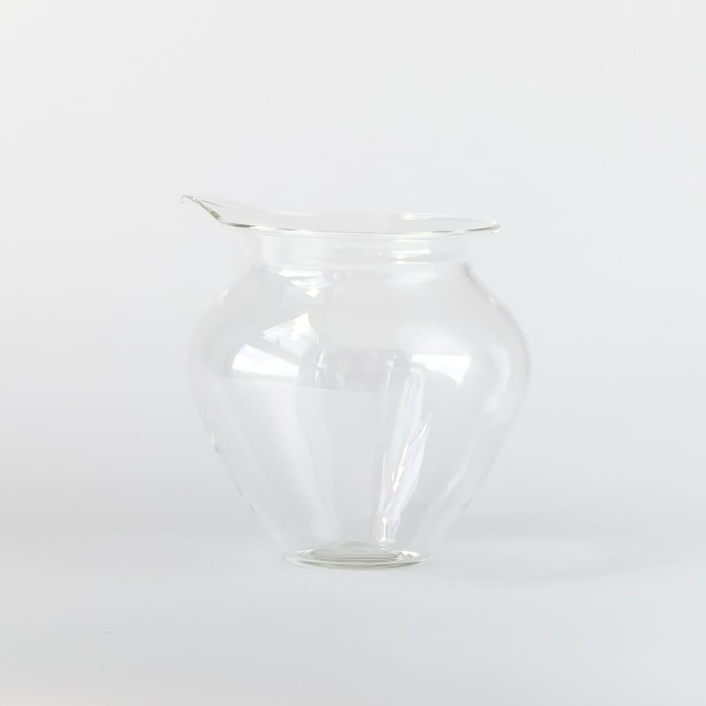 Clear glass cha hai on a white background